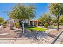 A house with a green lawn on a sunny day is a lovely sight at 3507 E Jasper Dr, Gilbert, AZ 85296