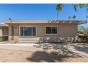 Charming single-story home featuring desert landscaping with a well-maintained facade and large windows at 13628 N 109Th Ave, Sun City, AZ 85351