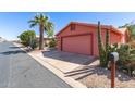 Charming single-story home with a two-car garage, desert landscaping, and an inviting front exterior at 2101 S Meridian Rd # 60, Apache Junction, AZ 85120