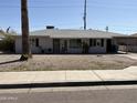 A single Gathering home featuring desert landscaping and an extended carport at 3431 W Campbell Ave, Phoenix, AZ 85017