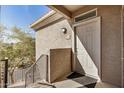 Exterior view of the front door and unit number on the condo at 3830 E Lakewood Pkwy # 3164, Phoenix, AZ 85048