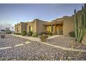 Southwestern home with desert landscaping and a welcoming front entrance at 39657 N Foxtail Ln, San Tan Valley, AZ 85140