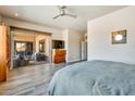 Spacious bedroom featuring a sliding glass door with patio access and ceiling fan at 4553 S Alamos Way, Gold Canyon, AZ 85118