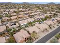 Expansive aerial view showcasing the neighborhood's well-maintained homes and landscaping, ideal for community living at 11136 E Greythorn Dr, Scottsdale, AZ 85262