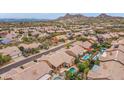Desirable community featuring homes with private pools and well-kept yards, situated amid scenic mountain vistas at 11136 E Greythorn Dr, Scottsdale, AZ 85262