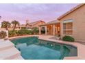 Relaxing backyard pool and desert landscaped patio offer a private outdoor oasis for enjoying Arizona's warm climate at 11136 E Greythorn Dr, Scottsdale, AZ 85262