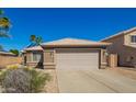 Charming single-story home with a two car garage and desert landscaping at 12622 W Catalina Dr, Avondale, AZ 85392
