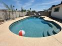 Refreshing pool with steps and beach ball, perfect for summer relaxation at 14803 N 55Th Ave, Glendale, AZ 85306