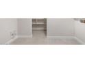 Pantry featuring tile floors and open shelving at 21288 N 272Nd Ln, Buckeye, AZ 85396