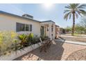 Inviting front entrance with a cozy patio area and desert landscaping for easy maintenance at 825 W 12Th St, Tempe, AZ 85281