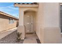 Close-up of the front door with a security screen and a welcoming entrance at 10515 W Pasadena Ave, Glendale, AZ 85307