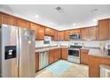 Functional kitchen with stainless steel appliances, ample cabinet space, and modern countertops at 15252 N 100Th St # 2141, Scottsdale, AZ 85260