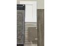 Close up of interior selections featuring flooring, carpet, cabinet, and countertop samples at 1800 W Caramel Ct, Queen Creek, AZ 85144