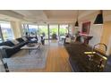 Contemporary living area with an open layout, comfortable seating, and large windows offering plenty of natural light at 7147 E Rancho Vista Dr # 7004, Scottsdale, AZ 85251