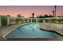 Inviting backyard pool with clean lines, ample patio space, and privacy greenery at 8233 E Hubbell St, Scottsdale, AZ 85257