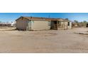 Exterior of mobile home with front porch in a lot at 19954 W Teepee Rd, Buckeye, AZ 85326