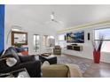 Bright living room boasting natural light, neutral walls, stylish furniture and decor at 4718 E Mossman Rd, Phoenix, AZ 85050