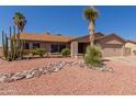 Charming single-story home featuring desert landscaping and an attached two-car garage at 6534 S Marilyn Ann Dr, Tempe, AZ 85283