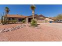 Charming single-story home featuring desert landscaping and an attached two-car garage at 6534 S Marilyn Ann Dr, Tempe, AZ 85283