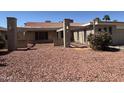 Lovely single-story house featuring desert landscaping, brick accents, and a cozy, inviting front yard at 8632 N 48 Dr, Glendale, AZ 85302