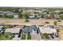 Property aerial view showcasing the home's layout, landscaping, and proximity to nearby amenities at 92 N Palm St, Gilbert, AZ 85234