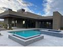 A backyard pool and spa with contemporary design, perfect for relaxing or entertaining at 10354 E Celestial Dr, Scottsdale, AZ 85262