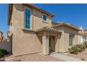 Charming single-Gathering home featuring desert landscaping, a tile roof, and a covered entry at 1926 W Busoni Pl, Phoenix, AZ 85023