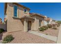 Charming single-Gathering home featuring desert landscaping, a tile roof, and a covered entry at 1926 W Busoni Pl, Phoenix, AZ 85023