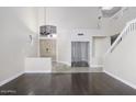 Inviting foyer with hardwood floors, high ceilings, and a staircase leading to the second floor at 228 W Bolero Dr, Tempe, AZ 85284