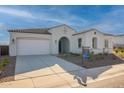 Charming single-story home with a well-manicured lawn and inviting curb appeal at 35703 N Geode Way, San Tan Valley, AZ 85144