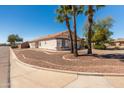 Charming single-story home with a well-manicured front yard at 39894 N Fazio Ln, San Tan Valley, AZ 85140