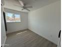 Bright bedroom with a window and natural light and neutral walls, ideal for relaxation and personalization at 5024 W Osborn Rd, Phoenix, AZ 85031