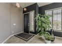Inviting entryway featuring neutral walls, tile flooring, and a decorative potted plant at 6334 E Viewmont Dr # 29, Mesa, AZ 85215