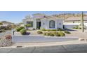 Charming single-story home featuring a low-maintenance desert landscape and a tile roof at 6334 E Viewmont Dr # 29, Mesa, AZ 85215