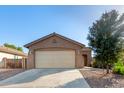 Charming single-story home featuring a two-car garage and desert landscaping at 2187 W Kristina Ave, Queen Creek, AZ 85144