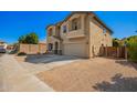 Charming two-story home featuring desert landscaping and a two-car garage at 4617 S Carmine --, Mesa, AZ 85212