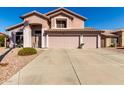 Charming two-story home with a three-car garage and well-maintained landscaping at 1737 S Talbot --, Mesa, AZ 85209