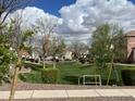 Beautiful neighborhood park with green space, mature trees, and walking path at 4786 E Laurel Ct, Gilbert, AZ 85234