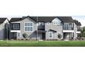 Modern townhouse with gray stucco, large windows, small trees, and a manicured green lawn in a tidy row of townhomes at 11300 N Casa Dega N Dr # 1047, Surprise, AZ 85388