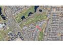 Aerial view of a residential area with golf course and community amenities, nestled within a well-planned neighborhood at 17332 W Wildwood St, Surprise, AZ 85388