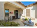 Cozy front porch with seating, creating a welcoming entrance to the home at 20916 E Arroyo Verde Dr, Queen Creek, AZ 85142
