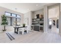 Bright office space featuring a built in bar area, desk, and large windows with a view at 23656 N 123Rd St # 240, Scottsdale, AZ 85255