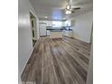 Bright kitchen featuring white cabinetry, stainless appliances, and a center island at 4924 W Catalina Dr, Phoenix, AZ 85031