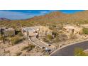Home under construction in desert landscape with mountain views at 7646 E Hidden Canyon St, Mesa, AZ 85207
