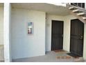 The front entrance has security doors and a welcome mat at 10444 N 69Th St # 128, Paradise Valley, AZ 85253
