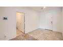 Inviting entryway featuring tile flooring and neutral walls, providing a blank canvas for your personal style at 10528 W Crown King Rd, Tolleson, AZ 85353