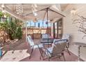 Enjoy a covered patio space with outdoor seating, perfect for relaxing or entertaining at 2455 E Broadway Rd # 13, Mesa, AZ 85204
