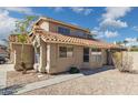 This home features a tile roof and desert landscaping at 2916 E Amber Ridge Way, Phoenix, AZ 85048