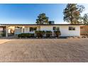 A lovely single story house with low maintenance gravel landscaping in the front yard at 4147 W Cheery Lynn Rd, Phoenix, AZ 85019