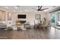 Inviting living room with stylish furniture, contemporary decor, and access to the outdoor balcony at 5100 E Rancho Paloma E Dr # 1046, Cave Creek, AZ 85331